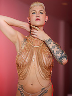 Chained Tempting Danni posing in chains. Danni Daniels. 