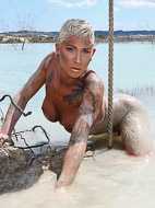 The lake Naughty TS Danni posing in mud. Danni Daniels. 